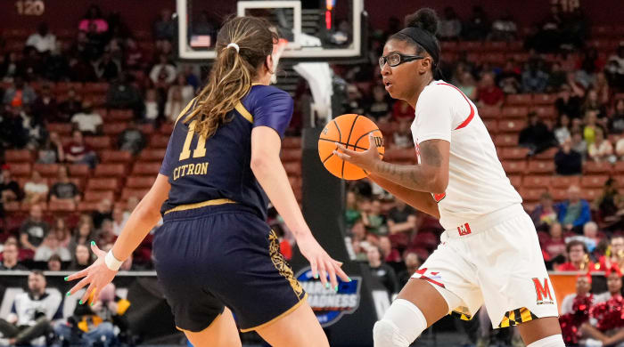 Maryland Terrapins guard Shyanne Sellers passes the ball while defended by Notre Dame Fighting Irish guard Sonia Citron during the Sweet 16 of the NCAA women’s tournament.